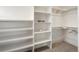 Large walk-in closet with ample shelving and hanging space at 2664 S Cherokee St, Denver, CO 80223