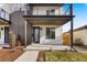 Modern two-story home with a covered front porch at 2664 S Cherokee St, Denver, CO 80223