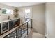 Modern wet bar with dark cabinetry and a wine cooler at 2664 S Cherokee St, Denver, CO 80223