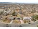 Aerial view of the house in a quiet neighborhood with mature trees and ample residential space at 8235 Auburn Ln, Westminster, CO 80031