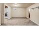Unfinished basement area with laundry room and window at 8235 Auburn Ln, Westminster, CO 80031