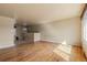 Bright living room with hardwood floors and lots of natural light from a large window at 8235 Auburn Ln, Westminster, CO 80031