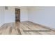 Spacious bedroom with hardwood floors and access to bathroom at 9719 Canyon Wind Pt, Parker, CO 80138