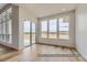 Bright breakfast nook with sliding glass doors and hardwood floors at 9719 Canyon Wind Pt, Parker, CO 80138