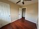 Bedroom with hardwood floors and a ceiling fan at 8047 Wolff St # H, Westminster, CO 80031