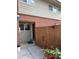 Inviting entryway with a brick facade, offering a glimpse of the charming exterior details and serene setting at 8047 Wolff St # H, Westminster, CO 80031