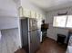 Functional kitchen features stainless steel appliances, ample cabinet space, and convenient layout for culinary endeavors at 8047 Wolff St # H, Westminster, CO 80031