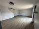 Spacious living room featuring sleek flooring, ample natural light, and neutral tones for versatile decorating at 8047 Wolff St # H, Westminster, CO 80031