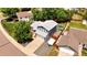 Aerial view of the home showcasing its roof, and backyard outdoor seating area at 8977 W Toller Ave, Littleton, CO 80128