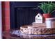 Close-up showcasing decorative accents with 'Home is my happy place' sign on a wooden table at 8977 W Toller Ave, Littleton, CO 80128