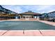 Community pool area showcasing a large pool covered for the off-season at 12063 Monaco Ct, Brighton, CO 80602