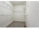 Large walk-in closet with wire shelving and hanging rods at 8363 Gladiola St, Arvada, CO 80005