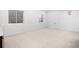 Unfinished basement with carpet, window wells, neutral paint, and recessed lighting at 4236 Zuni St, Denver, CO 80211