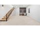 Finished basement with wet bar, open staircase, neutral carpet, and recessed lighting at 4236 Zuni St, Denver, CO 80211