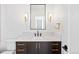 Stylish powder room featuring a modern vanity, elegant fixtures, and a sleek design at 4236 Zuni St, Denver, CO 80211