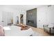 Open main bedroom with a modern fireplace and sleek finishes, creating a cozy and inviting space at 4236 Zuni St, Denver, CO 80211