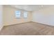 Bright bedroom features neutral walls and plush carpeting, offering a cozy and inviting atmosphere at 39867 Floyd St, Elizabeth, CO 80107