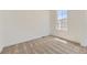 Inviting bedroom with neutral walls, plush carpet, and a sun-drenched window at 39867 Floyd St, Elizabeth, CO 80107