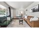 Spacious living room with hardwood floors, ample seating, and a comfortable, inviting atmosphere at 970 S Canosa Ct, Denver, CO 80219