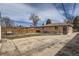 Large backyard with patio, grass area, swing set and space for parking at 1781 Uinta St, Denver, CO 80220