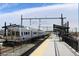 Light rail train sitting at a modern station ready for commuters to start their day at 1781 Uinta St, Denver, CO 80220