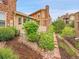 Well-maintained backyard featuring lush landscaping, a charming patio, and an inviting atmosphere at 9246 Sori Ln, Highlands Ranch, CO 80126