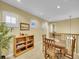 Cozy loft with a wooden table and chairs, perfect for a home office or game room at 9246 Sori Ln, Highlands Ranch, CO 80126