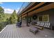 Spacious deck with stylish seating and beautiful mountain views at 960 Aspen Pl, Evergreen, CO 80439