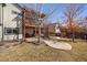 Two-story home featuring a spacious backyard with a patio area and upper deck, ideal for outdoor living at 21142 Hawthorne Ln, Parker, CO 80138