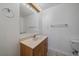 Clean bathroom with vanity, mirror, and towel racks, providing a functional space at 21142 Hawthorne Ln, Parker, CO 80138