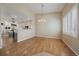 Elegant dining room with hardwood floors, perfect for Gathering meals or formal gatherings with an open view to the kitchen at 21142 Hawthorne Ln, Parker, CO 80138