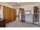 Comfortable bedroom with closet, ceiling fan, and doorway at 2912 Lake Park Way, Longmont, CO 80503