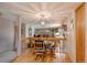 Cozy dining area with a view to the living room featuring a fireplace at 2912 Lake Park Way, Longmont, CO 80503