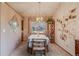 Cozy dining room featuring a chandelier, Gathering photos, and views of the outdoors at 2912 Lake Park Way, Longmont, CO 80503
