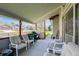 Cozy covered patio is perfect for outdoor gatherings and enjoying the fresh air at 2912 Lake Park Way, Longmont, CO 80503