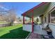 Cozy covered porch with comfortable seating, offering a relaxing outdoor space at 2912 Lake Park Way, Longmont, CO 80503
