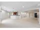 Inviting basement area with a bar, carpeted floors, and recessed lighting perfect for entertaining at 2832 Danbury Ave, Highlands Ranch, CO 80126