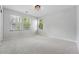 Bedroom featuring carpeted floors and three windows providing ample natural light at 2832 Danbury Ave, Highlands Ranch, CO 80126
