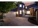 Striking two-story home with a stone turret, a two-car garage, and a wide concrete driveway at 2832 Danbury Ave, Highlands Ranch, CO 80126