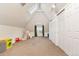 Spacious finished attic with skylights, storage closets, and a play area for children at 511 S Pennsylvania St, Denver, CO 80209