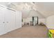 Spacious finished attic with skylights, storage closets, and a play area for children at 511 S Pennsylvania St, Denver, CO 80209