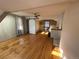 Bright living space with hardwood floors, barn door, and kitchenette at 511 S Pennsylvania St, Denver, CO 80209