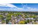 Breathtaking aerial perspective capturing a vibrant neighborhood with expansive skyline views at 13323 Birch Cir, Thornton, CO 80241