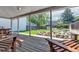 Back porch featuring a wooden deck, rock landscaping, and views of the private backyard at 13323 Birch Cir, Thornton, CO 80241