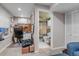Basement featuring an office, a full bathroom, and convenient access to additional storage at 13323 Birch Cir, Thornton, CO 80241