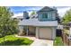 Charming two-story home with a front porch and well-manicured lawn, perfect for outdoor relaxation and curb appeal at 13323 Birch Cir, Thornton, CO 80241