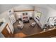 Open living room with vaulted ceilings, a beam, a view of the backyard, and a staircase at 8825 Fairview Oaks Pl, Lone Tree, CO 80124