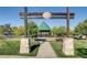 Community gazebo nestled in a landscaped park setting with walking paths and mature trees at 1896 Hogan Ct, Castle Rock, CO 80109