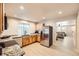 Spacious kitchen featuring granite countertops, stainless appliances, and hardwood floors at 1896 Hogan Ct, Castle Rock, CO 80109