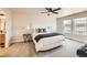 Inviting main bedroom featuring neutral tones, modern ceiling fan and great natural light at 1896 Hogan Ct, Castle Rock, CO 80109